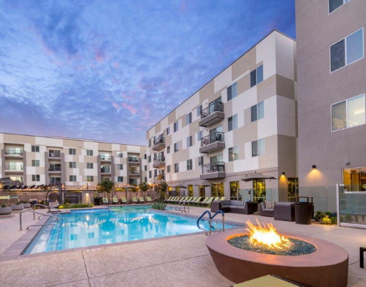 The Thomas at Midtown Phoenix Apartments Pool Featuring Lounge Area with Fire Pit